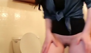 Aurelia pooping in toilet