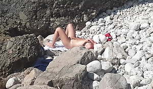 Voyeur guy got lucky at a naturist beach in Greece