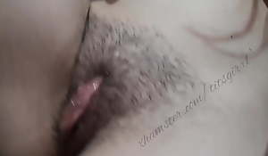 Dripping wet hairy pussy with large labia and fingering